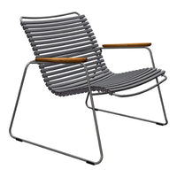 Gray striped lounge chair with sleek metal frame and wooden armrests, perfect for modern outdoor spaces.