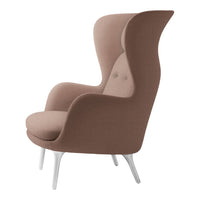 Stylish high-back chair in soft taupe fabric with a minimalist design and white legs, perfect for modern interiors.