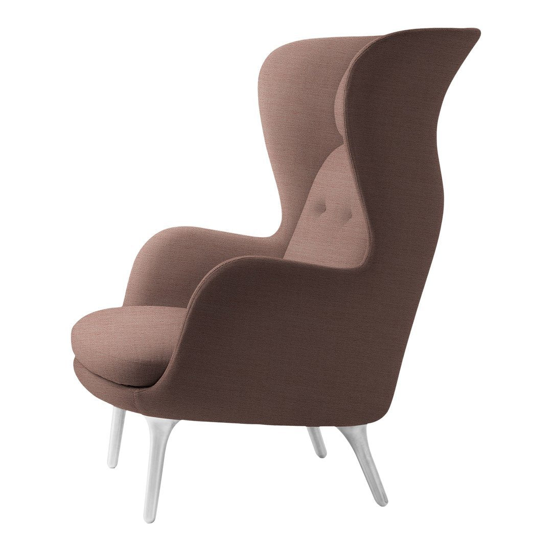 Elegant brown upholstered chair with smooth contours and white legs, perfect for modern decor.