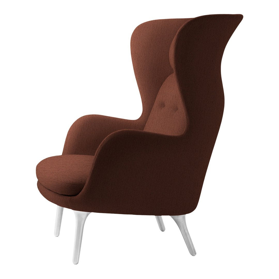 Brown upholstered high-back chair with smooth contours and sleek white legs, perfect for modern decor.