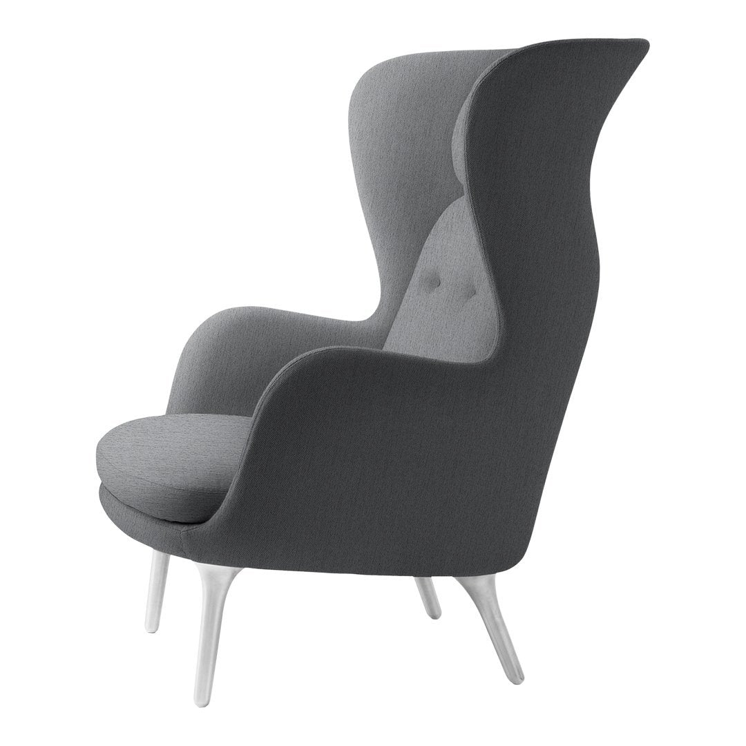 Stylish two-tone gray upholstered chair with a modern high-back design and sleek white legs. Perfect for contemporary decor.
