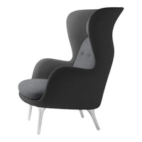 Stylish wingback chair in sleek black with a soft gray seat, showcasing smooth, modern lines and contrasting hues.