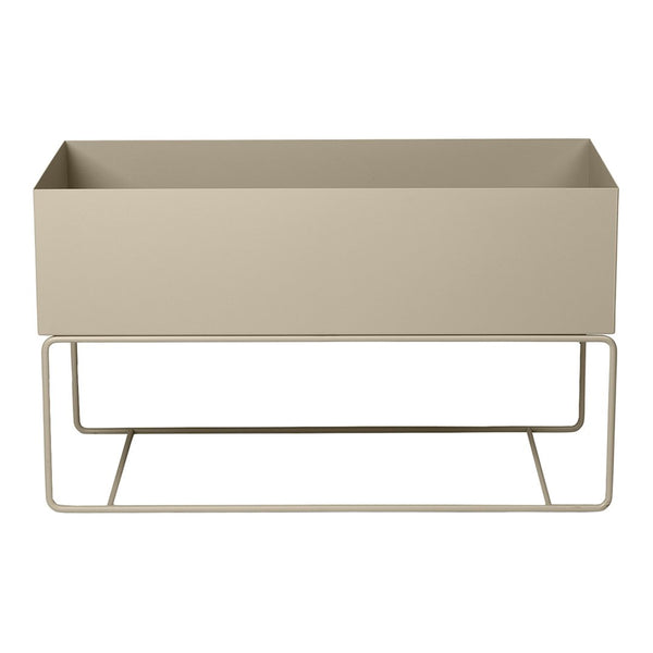 Beige rectangular planter with a minimalist design and a simple metal stand. Perfect for modern decor.