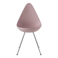 Pink teardrop chair with sleek silver legs, perfect for modern decor. Stylish and minimalistic design.