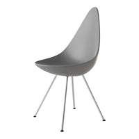 Sleek gray chair with a smooth, minimalist design and slender metal legs, perfect for modern decor.