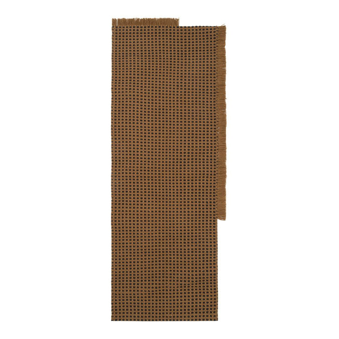 Brown woven rug with a grid pattern in dark and light shades, adding texture and warmth to any space.