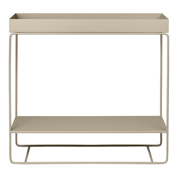 Beige metal storage shelf with a minimalist design and smooth top and bottom surfaces. Perfect for modern decor.
