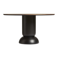 Round dining table with a warm wood top and a sleek black pedestal base. Modern, minimalist design with contrasting colors.