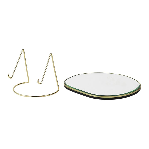 Gold wire stand with a smooth, circular black and white base featuring a subtle green outline.