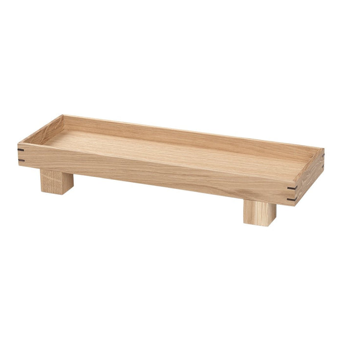 Light natural wood tray with a smooth finish and simple design, featuring a rectangular shape and sturdy base.