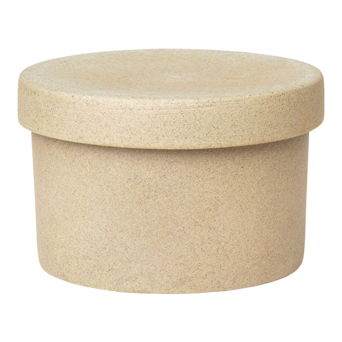 Beige round storage container with a smooth, minimalist design. Perfect for organizing any space.