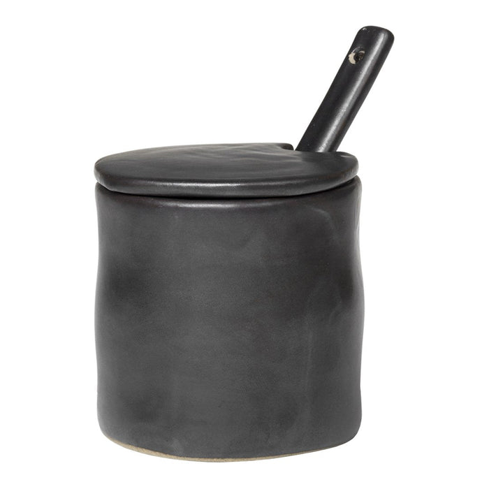 Black ceramic container with a smooth finish and a matching lid, featuring a sleek handle.