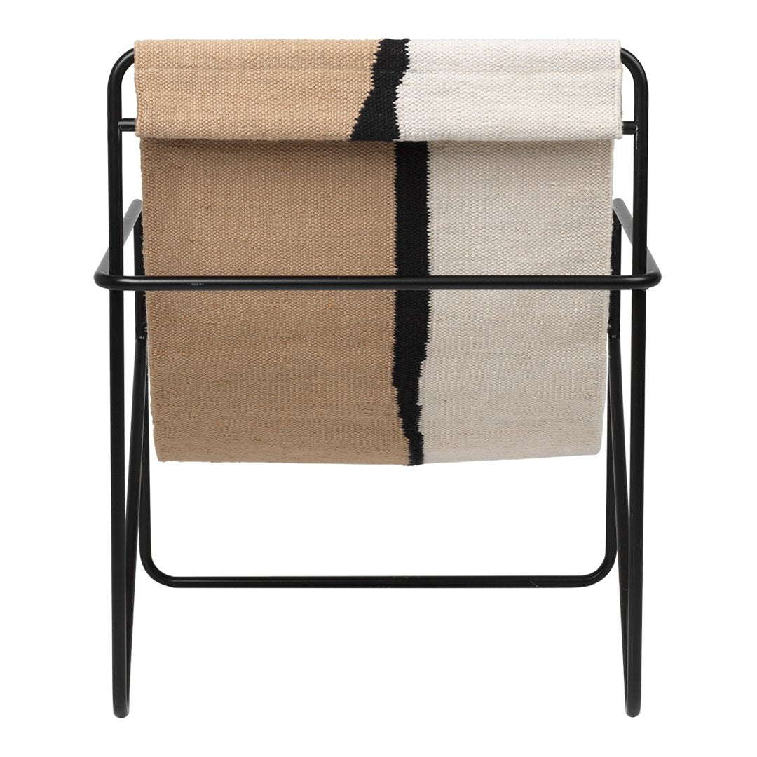 Tan, cream, and black striped throw blanket displayed on a minimalist black frame.