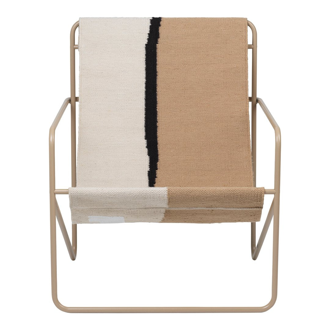 Beige and white patterned lounge chair with a bold black stripe. Modern design for stylish interiors.