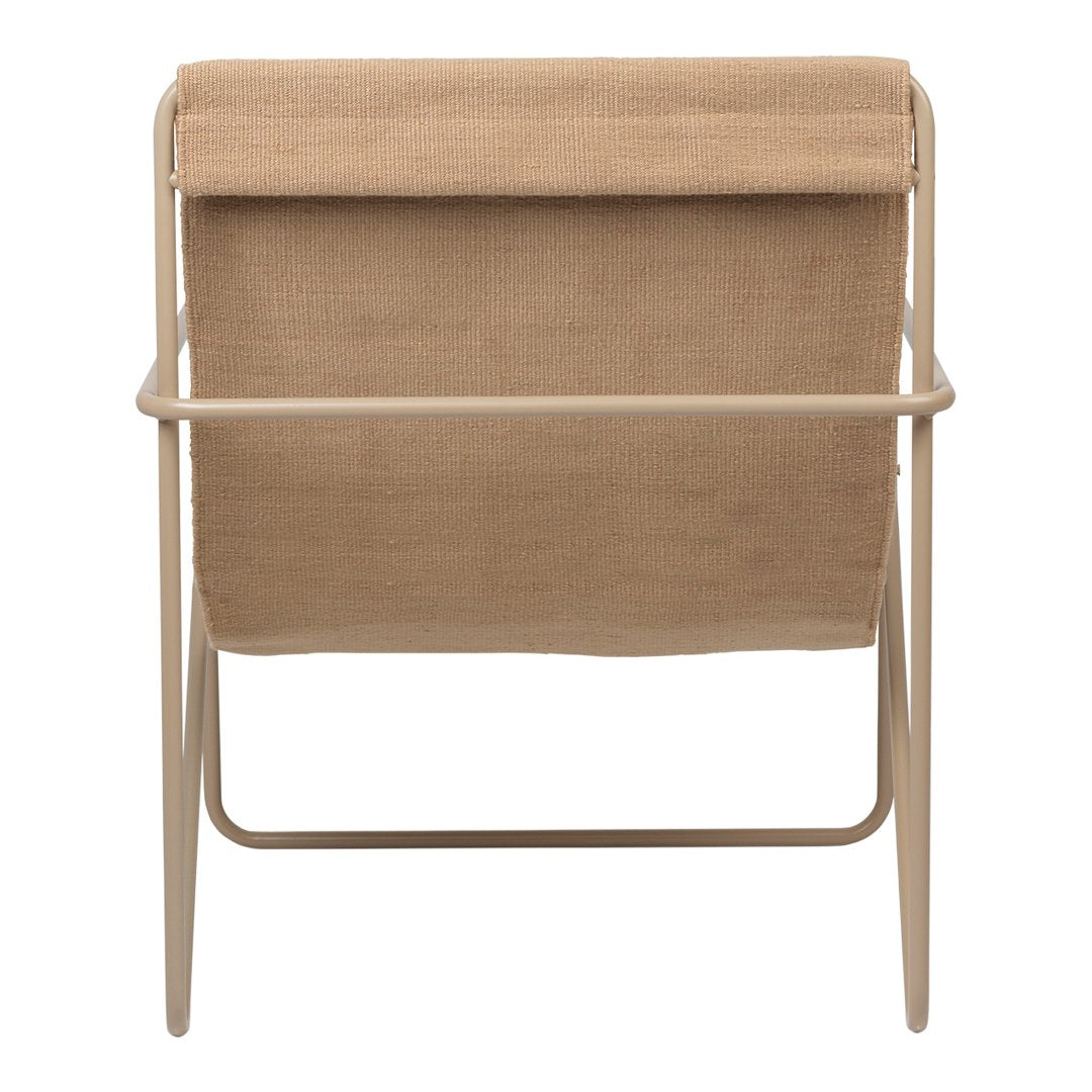 Tan fabric chair with a minimalist beige frame, featuring a simple, smooth design. Perfect for modern settings.