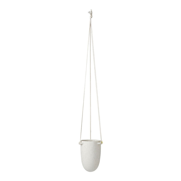 Hanging planter in smooth white finish with minimalist design and natural rope suspension.