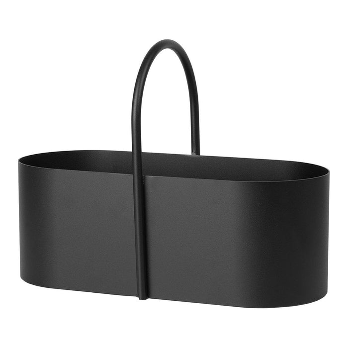 Sleek black metal storage basket with a minimalist design and curved handle, perfect for modern decor.
