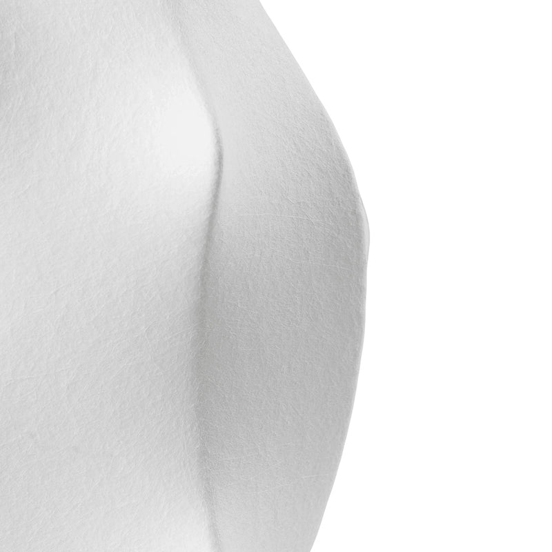Close-up of smooth, white texture with subtle curves and a clean, minimalist design. Perfect for modern decor.