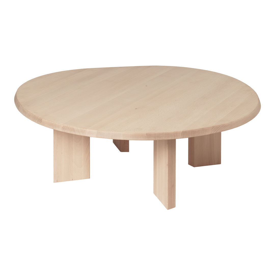 Light beige circular coffee table with a smooth, solid wood surface and minimalist design.
