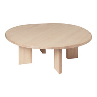 Light beige circular coffee table with a smooth, solid wood surface and minimalist design.