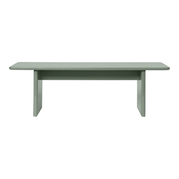 Mint green rectangular table with a smooth surface and simple design, perfect for modern interiors.
