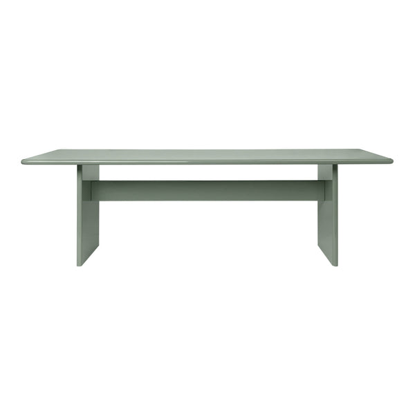 Stylish rectangular table in soft green with a smooth surface and minimalist design, perfect for modern spaces.