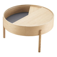 Round wooden coffee table featuring light oak finish with a contrasting dark geometric inlay. Modern and stylish design.