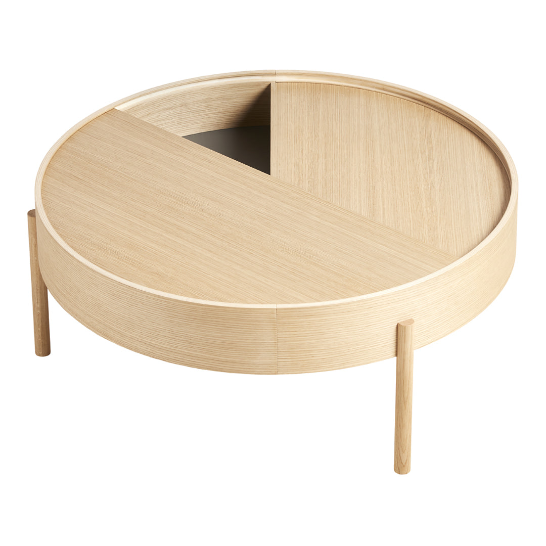 Light oak round coffee table with a two-tone wood pattern and minimalist design, featuring a sleek, modern finish.