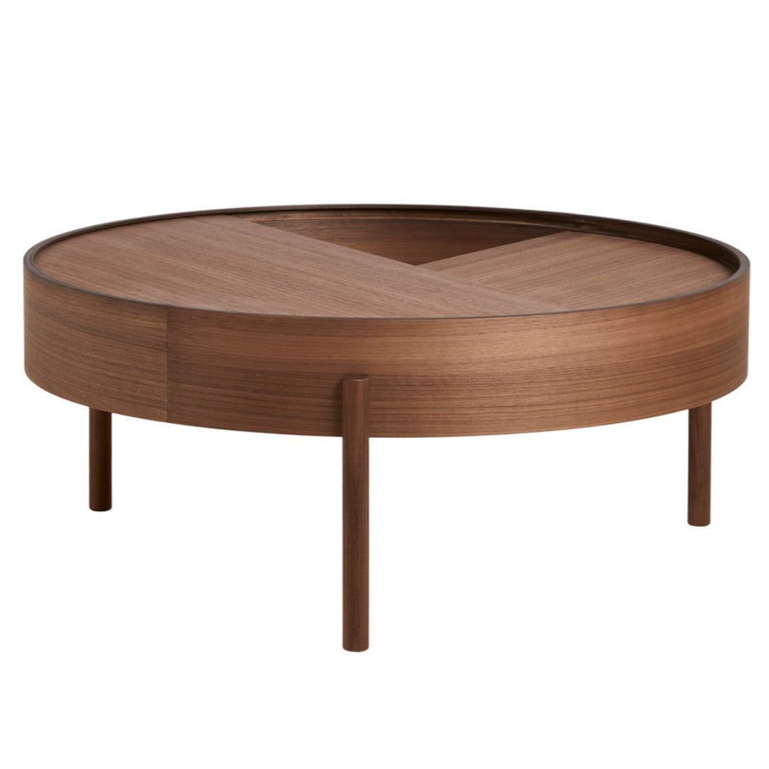 Round wooden coffee table with a rich walnut finish and a geometric V-pattern inlaid on the surface.