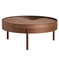 Round wooden coffee table with a rich walnut finish and a geometric V-pattern inlaid on the surface.