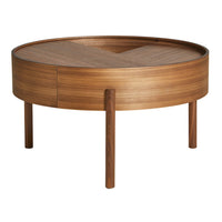 Round wooden coffee table with a natural walnut finish and a smooth pattern. Elegant design with tapered legs.