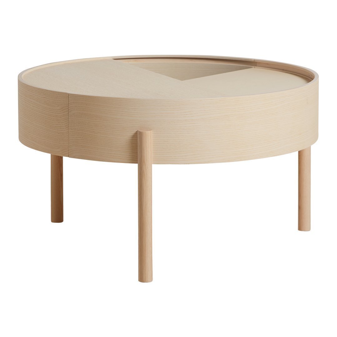 Light wood round coffee table with minimalist design and subtle natural grain patterns. Ideal for modern decor.
