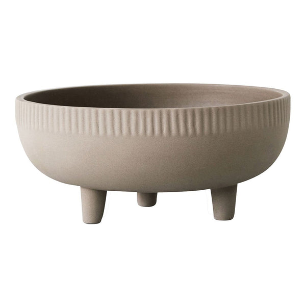 Round beige ceramic bowl with textured ribbed pattern and three short legs. Perfect for decorative displays.