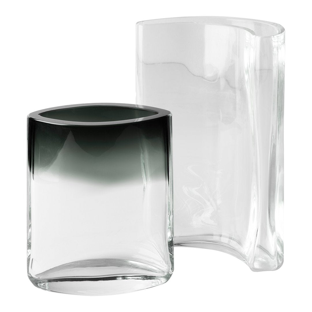 "Set of two glass vases: one clear, one with a deep green ombre effect at the top."