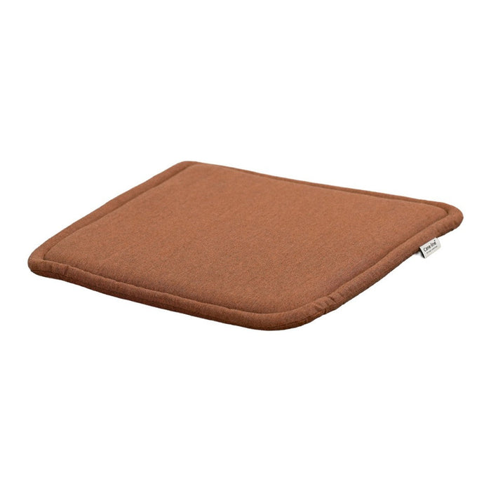 Brown square cushion with a smooth, textured surface and rounded edges, perfect for cozy seating.