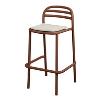 Brown metal bar stool with sleek lines and a cream-colored seat cushion. Modern and minimalistic design.