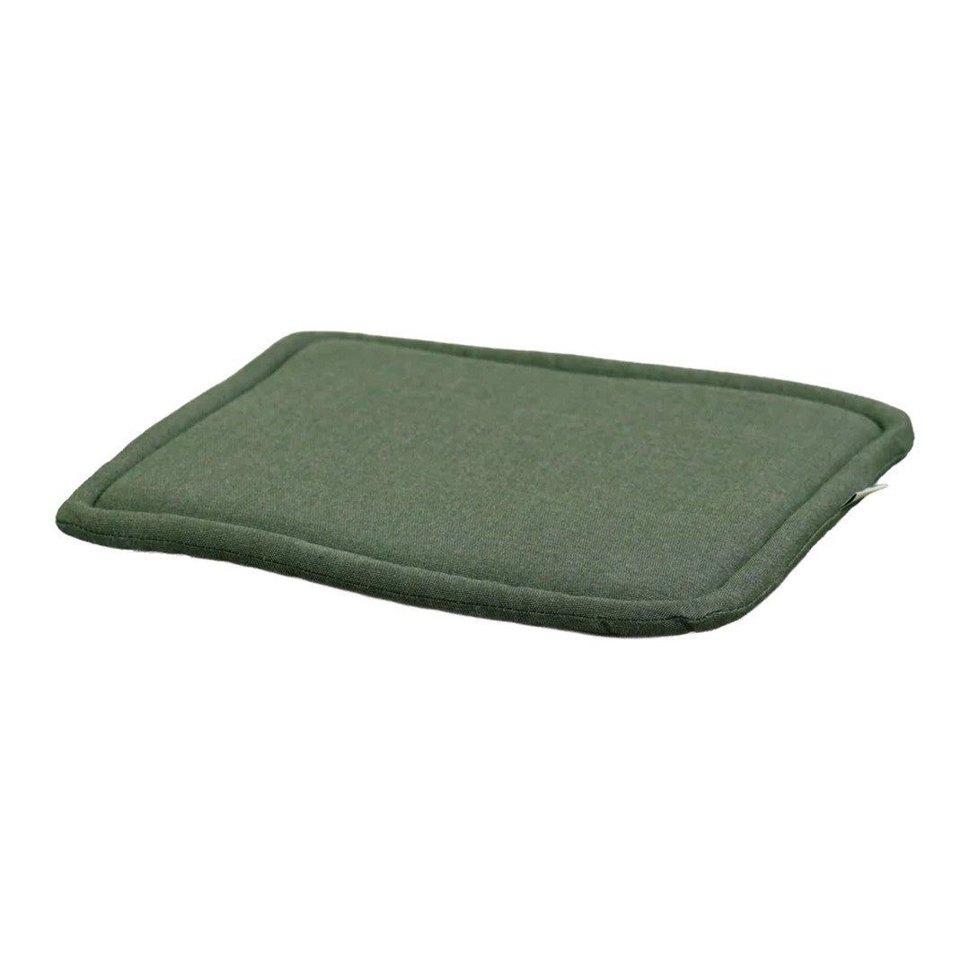 Green rectangular cushion with a textured surface and contrast stitching along the edges.