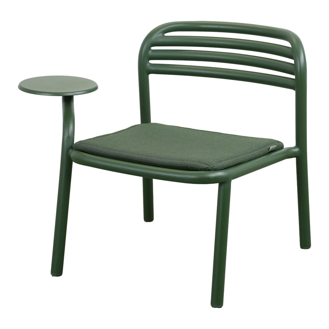 Green metal chair with a sleek striped backrest and a round side table, featuring a cushioned seat in matching green.