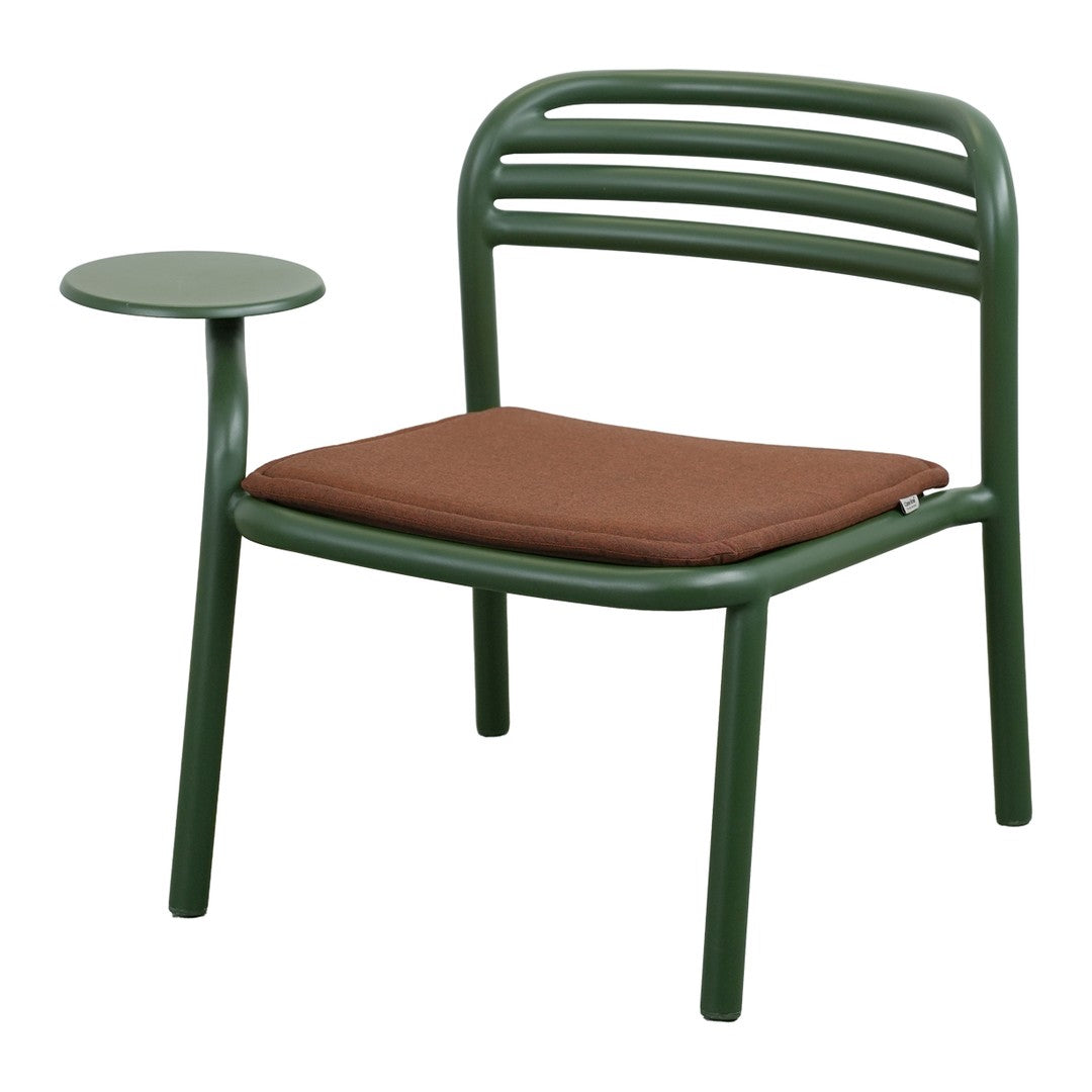 Green chair with brown cushion and a side table, featuring sleek lines and minimalist design. Ideal for outdoor use.