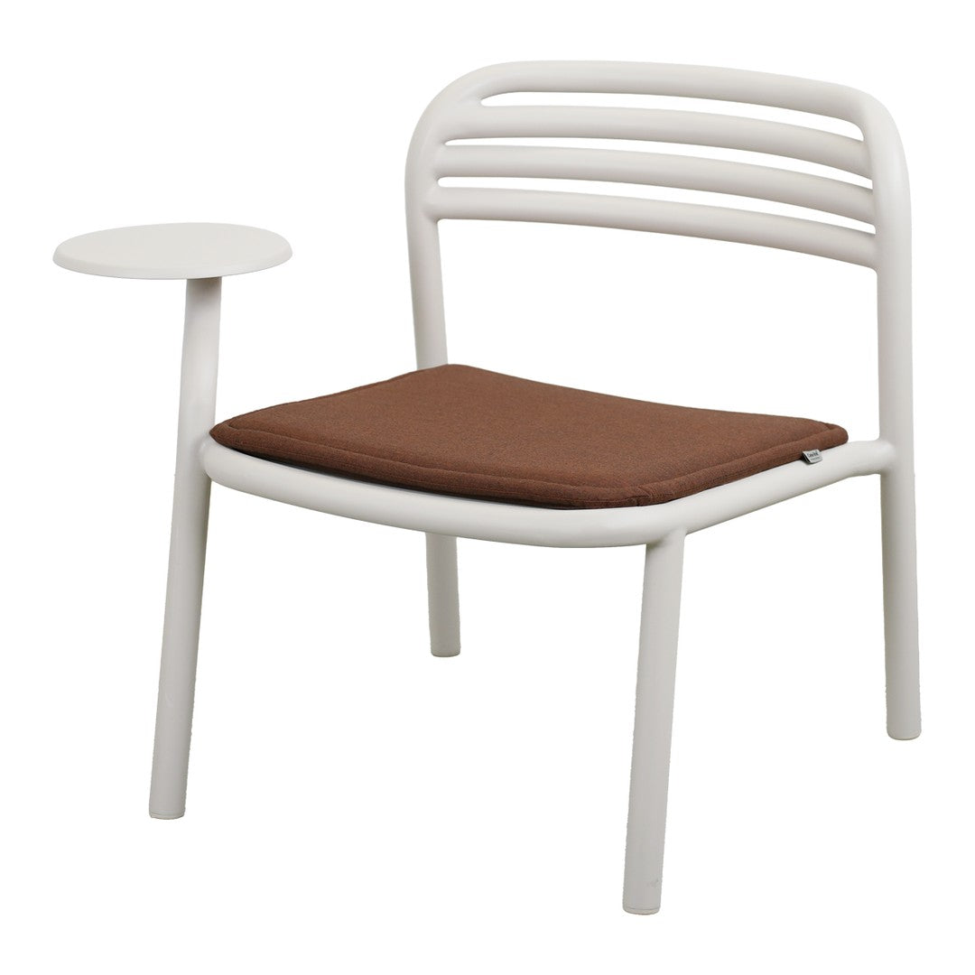 White chair with a brown seat cushion and a sleek side table, featuring minimalistic lines and a modern design.