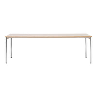 Sleek white tabletop with natural wood grain trim and silver metal legs, offering a modern minimalist design.