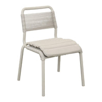 Light gray chair featuring a ribbed backrest and a plush, textured seat, perfect for modern decor.