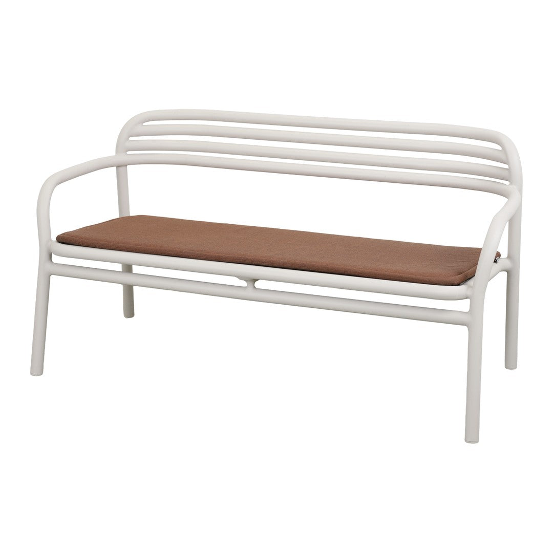 White metal bench with a smooth, curved design and a warm brown cushion. Simple, modern aesthetic for outdoor spaces.