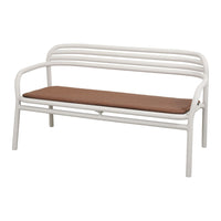 White metal bench with a smooth, curved design and a warm brown cushion. Simple, modern aesthetic for outdoor spaces.