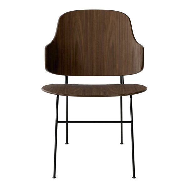 Modern chair featuring a rich walnut wood finish and sleek black metal legs for a stylish, minimalist look.
