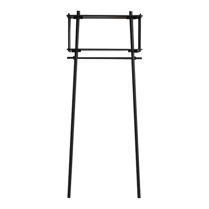 Black minimalist easel with a sleek and simple design, featuring straight lines and a modern aesthetic.
