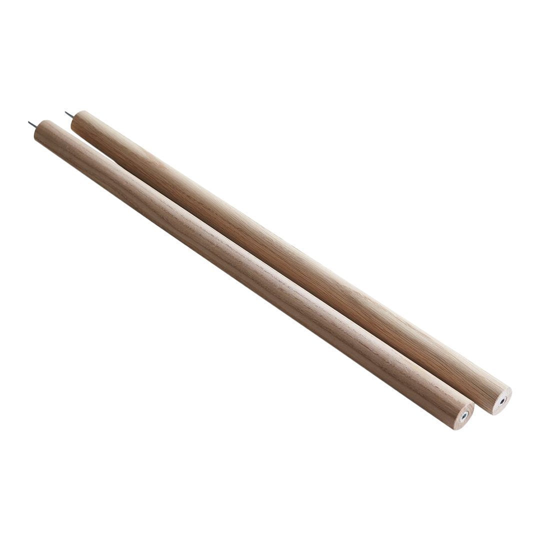 Natural wood craft dowels in a smooth, light beige finish, perfect for various DIY projects.