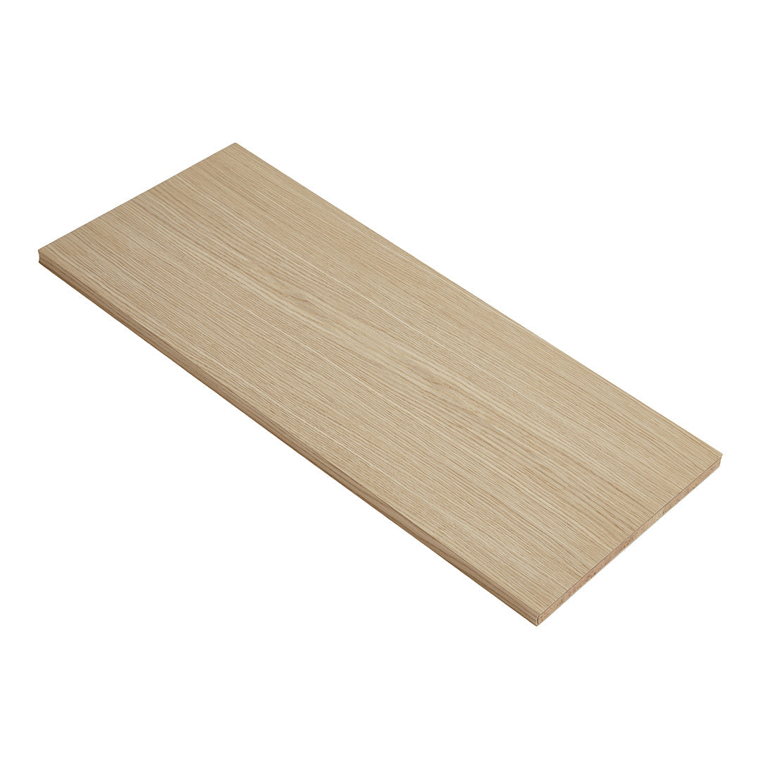 Light oak wood panel with a smooth finish, showcasing subtle grain patterns in natural beige tones.
