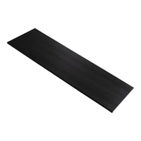 Sleek black rectangular mat with a smooth texture, perfect for modern decor.