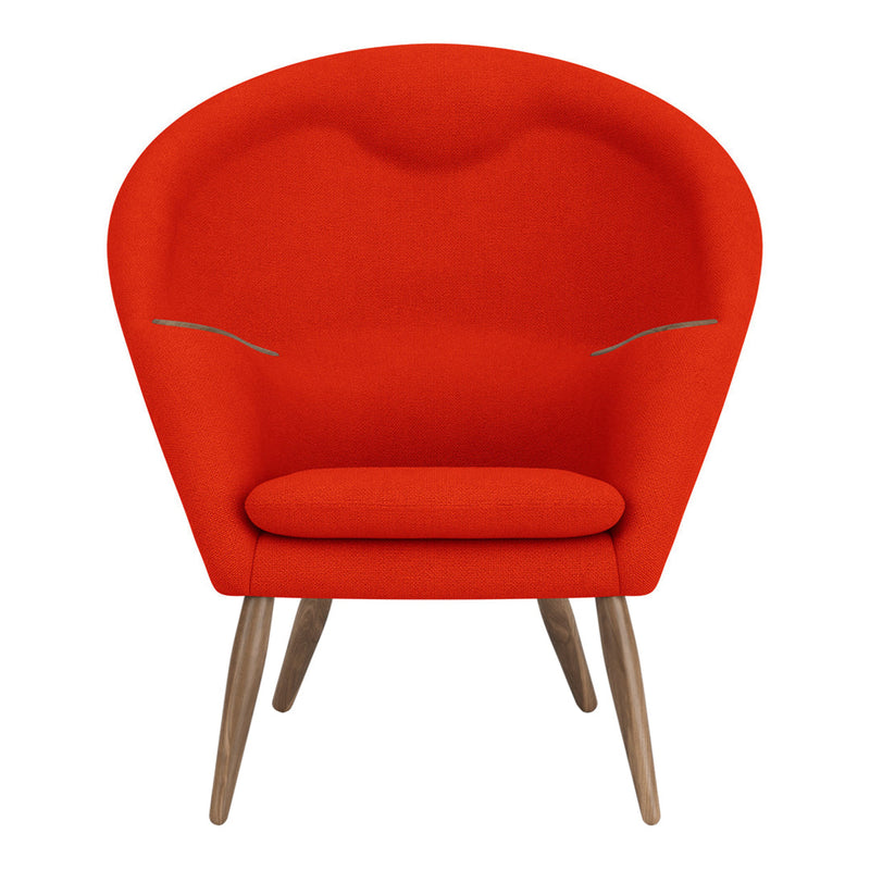 Bright orange chair with smooth fabric and subtle gray stitching, featuring a contemporary design and wooden legs.
